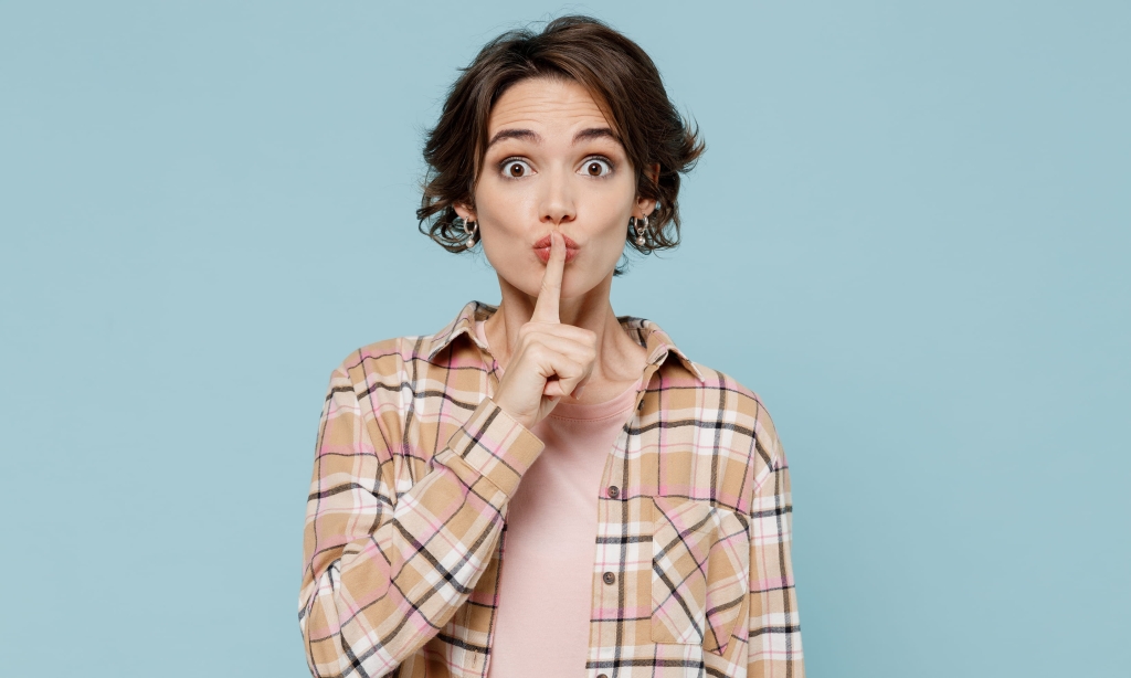Image of a woman shushing